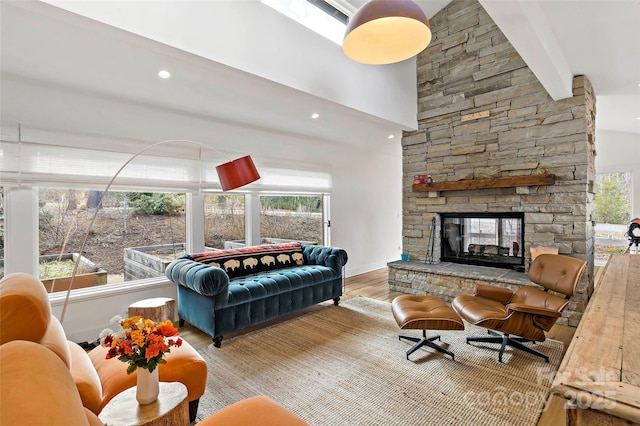 living room featuring hardwood / wood-style flooring and a fireplace