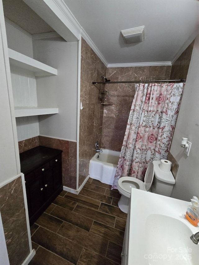 full bathroom with ornamental molding, vanity, toilet, and shower / bath combo with shower curtain