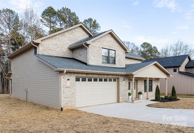 view of front of property featuring a garage