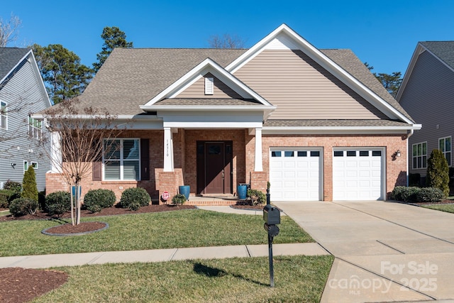 craftsman house with a front lawn