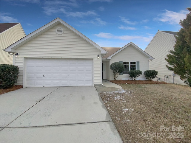 single story home featuring a garage