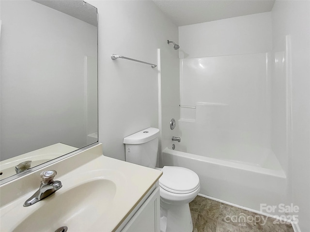 full bathroom featuring vanity, shower / bathing tub combination, and toilet