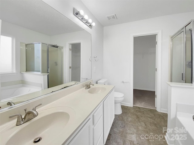 full bathroom featuring toilet, vanity, and plus walk in shower