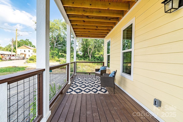 deck with covered porch