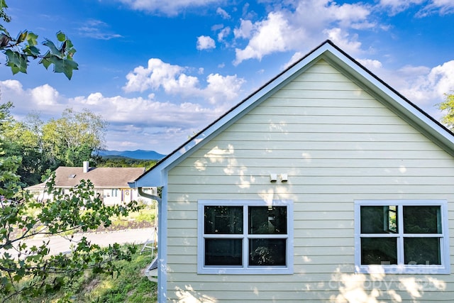 view of side of property featuring a mountain view