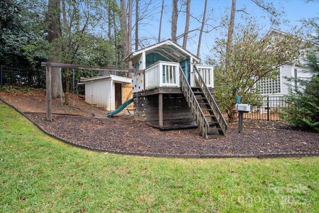 view of jungle gym featuring a yard