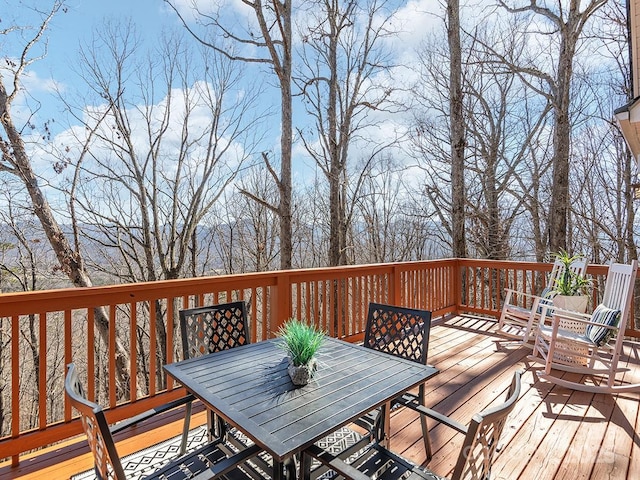 deck featuring outdoor dining space