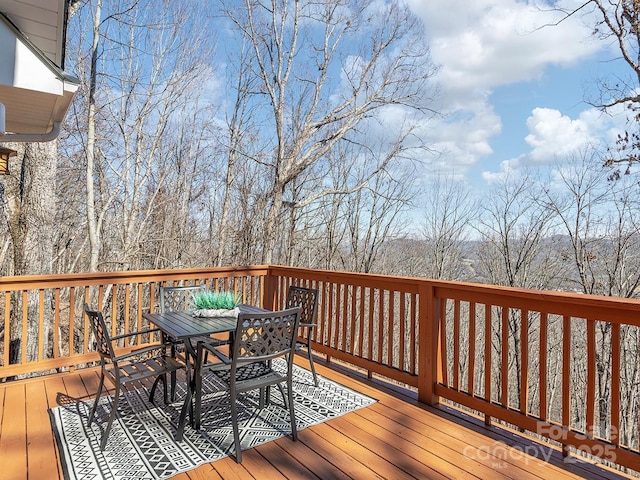 deck featuring outdoor dining space