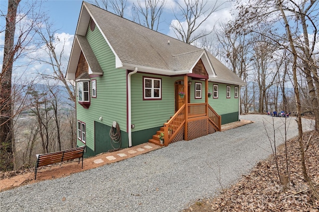 view of front of home with roof with shingles