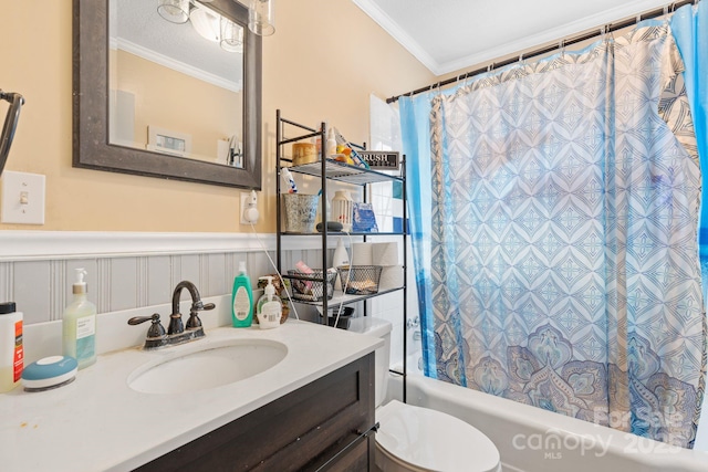 full bathroom with ornamental molding, vanity, shower / bathtub combination with curtain, and toilet