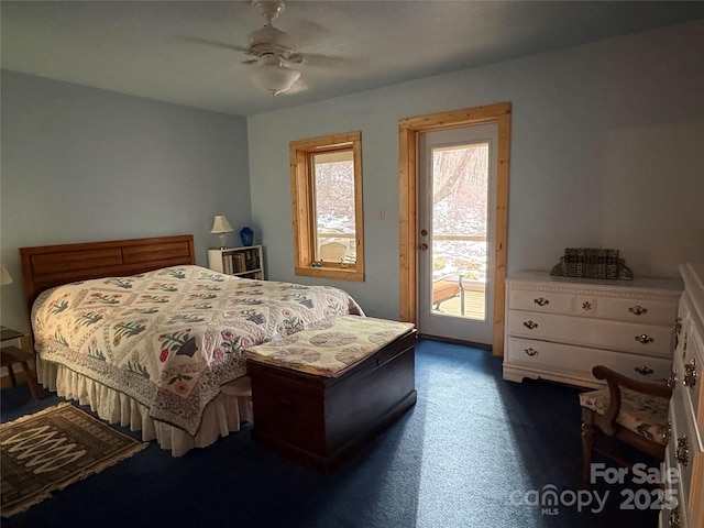 carpeted bedroom with access to exterior and ceiling fan