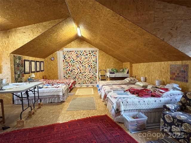 bedroom featuring lofted ceiling