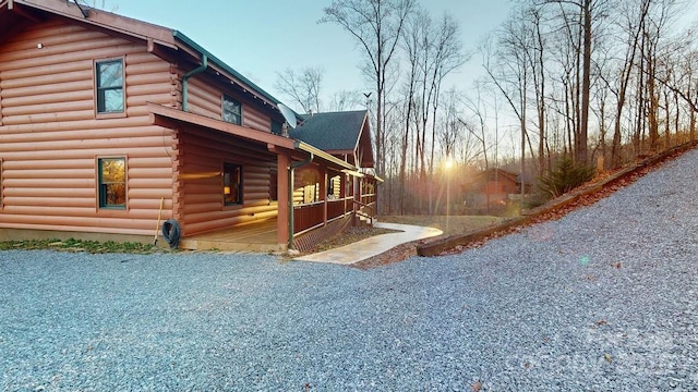 view of property exterior at dusk