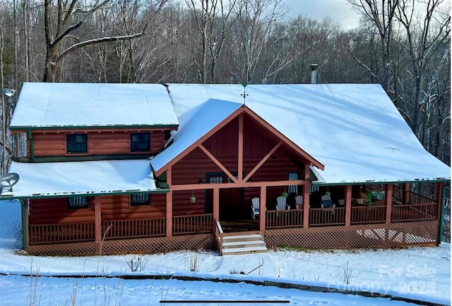 714 Heartwood Dr, Marion, NC 28752 - view of front of house featuring covered porch and log veneer siding