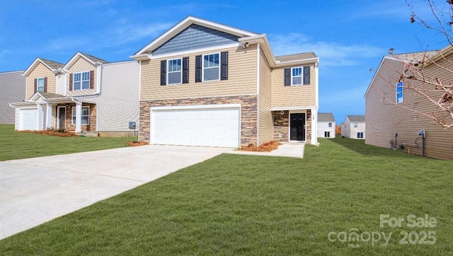 view of front facade featuring a garage and a front lawn