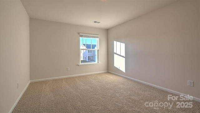 view of carpeted spare room