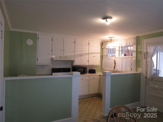 kitchen featuring black microwave, white cabinetry, and crown molding