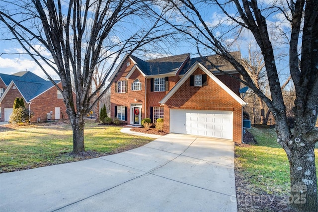 view of front of property with a garage and a front lawn