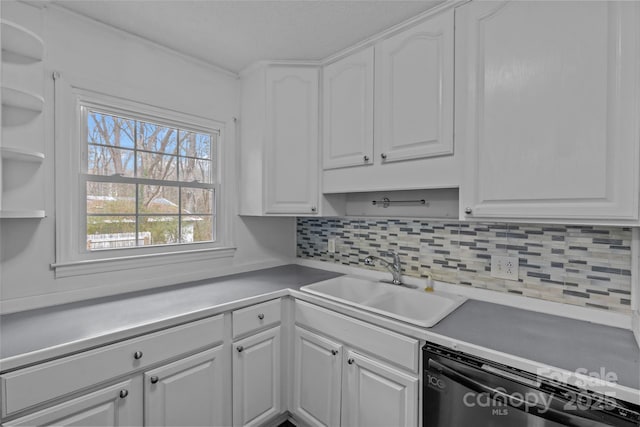 kitchen with white cabinetry, sink, tasteful backsplash, and black dishwasher