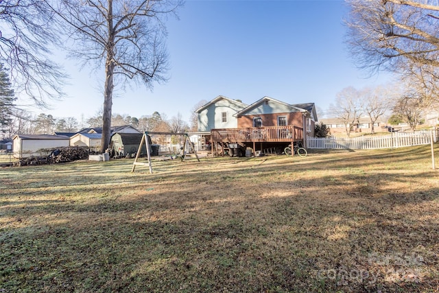 view of yard with a wooden deck