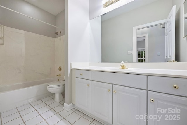 full bathroom featuring vanity, tile patterned floors, bathing tub / shower combination, and toilet