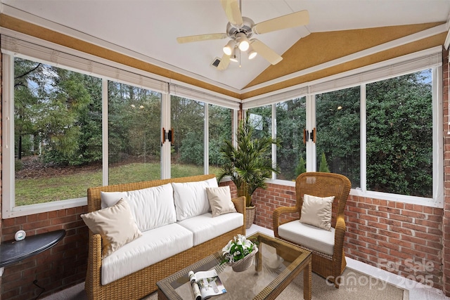 sunroom / solarium with vaulted ceiling and ceiling fan