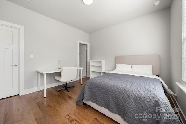 bedroom featuring hardwood / wood-style flooring