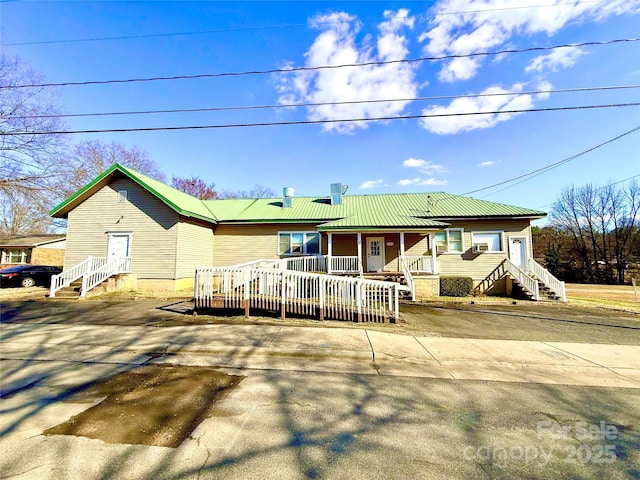 view of front of house with metal roof