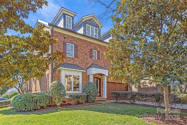 view of front facade with a front lawn