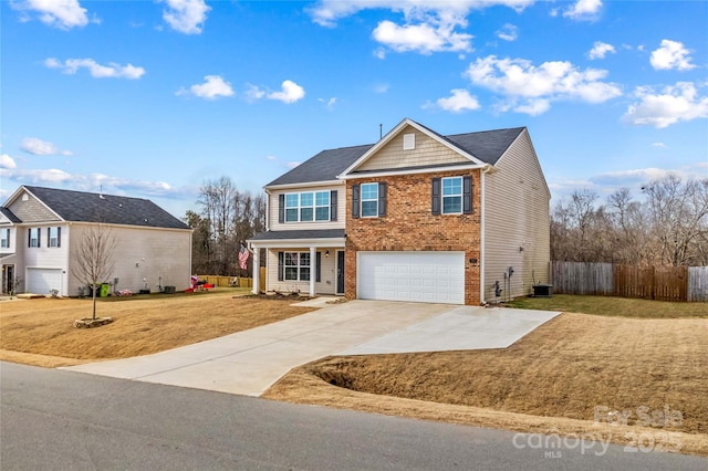 front of property with a garage and a front yard