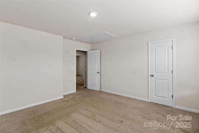 empty room featuring carpet flooring