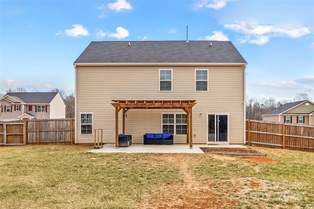 back of property featuring a patio, a lawn, and a pergola