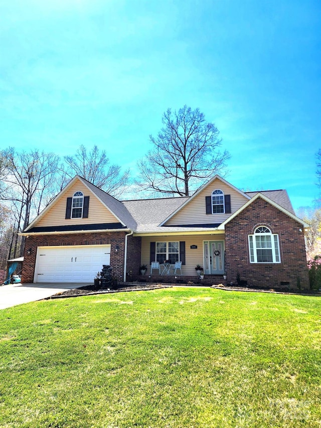 306 Bluegill Ln, Statesville, NC 28625 - ranch-style home featuring driveway, a front yard, brick siding, a porch, and a garage