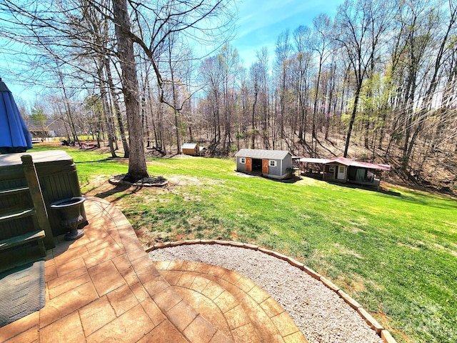 306 Bluegill Ln, Statesville, NC 28625 - view of yard with a storage shed and an outdoor structure