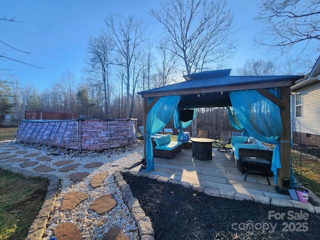 306 Bluegill Ln, Statesville, NC 28625 - view of patio / terrace with an outdoor living space with a fire pit and a gazebo