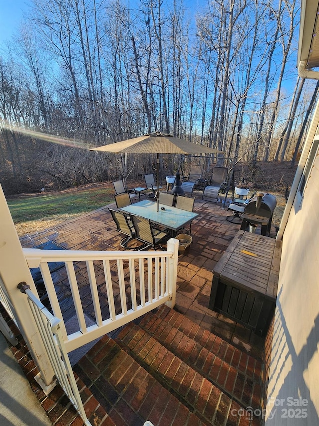 306 Bluegill Ln, Statesville, NC 28625 - wooden terrace featuring outdoor dining space and a patio area