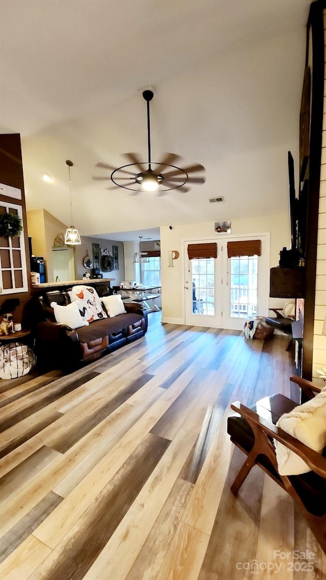 306 Bluegill Ln, Statesville, NC 28625 - living room featuring visible vents, french doors, ceiling fan, and wood finished floors