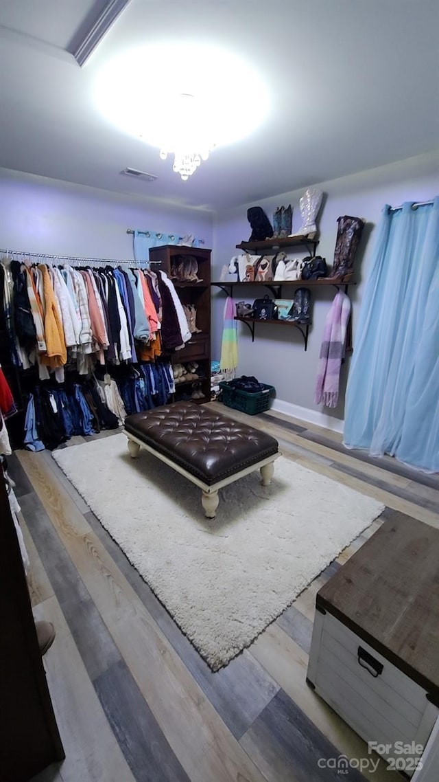306 Bluegill Ln, Statesville, NC 28625 - walk in closet with wood finished floors