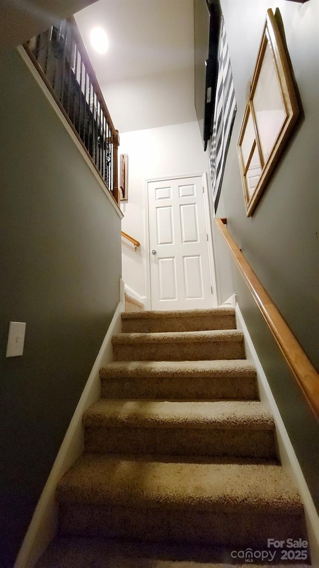 306 Bluegill Ln, Statesville, NC 28625 - staircase featuring baseboards
