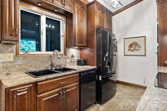 kitchen with light tile patterned flooring, sink, crown molding, decorative backsplash, and black appliances