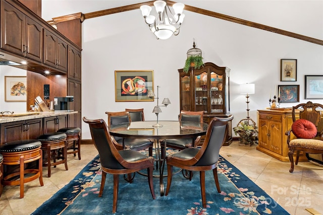 dining area featuring ornamental molding, vaulted ceiling, light tile patterned floors, and an inviting chandelier