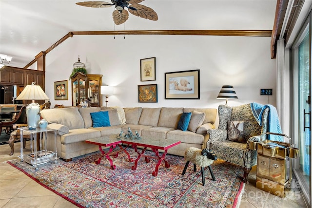 tiled living room with ornamental molding, lofted ceiling, and ceiling fan