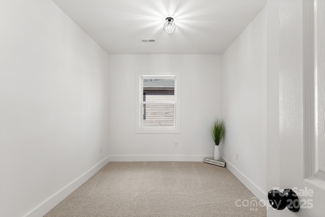 empty room featuring carpet flooring