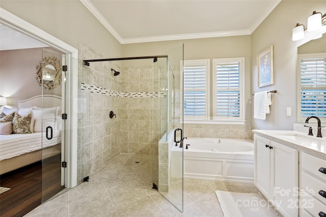 bathroom with vanity, crown molding, tile patterned floors, and plus walk in shower