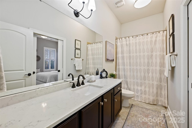 bathroom with vanity, a shower with curtain, and toilet