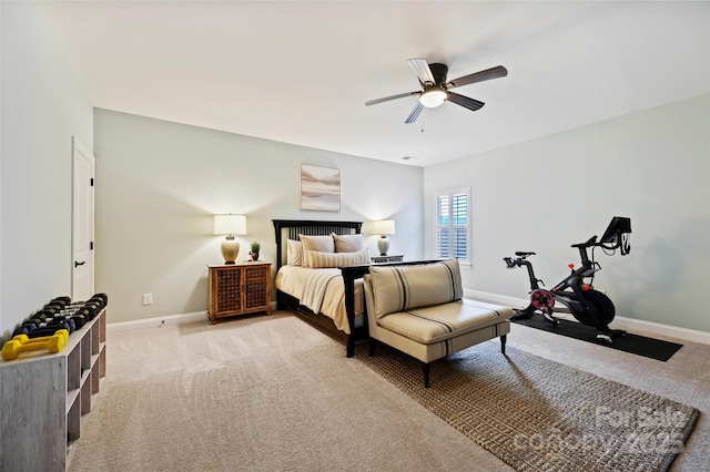 bedroom featuring ceiling fan and light colored carpet