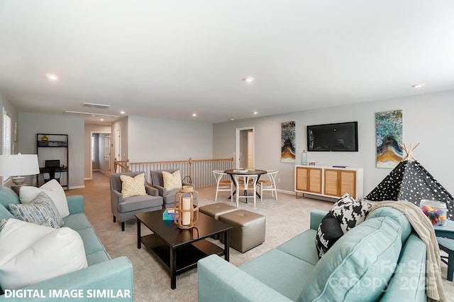 living room featuring light colored carpet