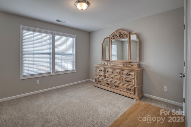 unfurnished bedroom featuring carpet flooring