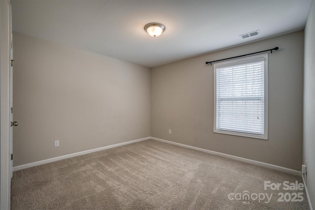 view of carpeted spare room