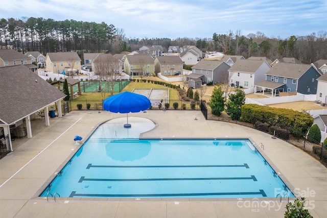 view of swimming pool featuring a patio